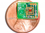 An image representing the tiny size of the chip - it is about half the area of a 1 cent coin