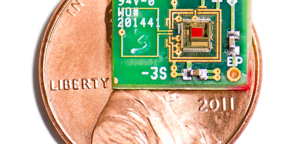 An image representing the tiny size of the chip - it is about half the area of a 1 cent coin