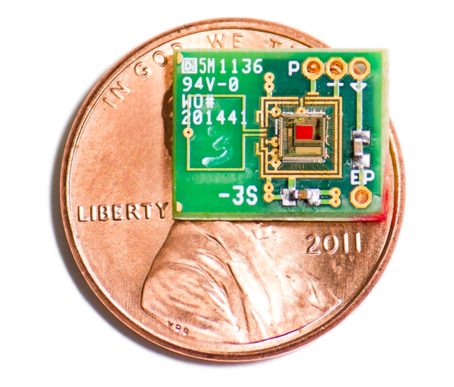 An image representing the tiny size of the chip - it is about half the area of a 1 cent coin