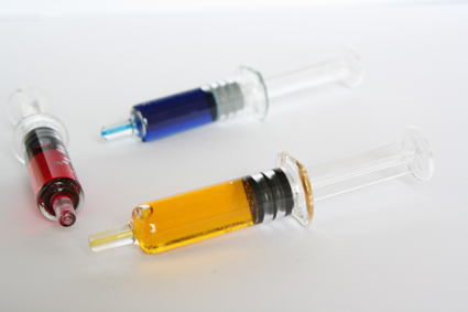 Photo of syringes containing colourful liquid